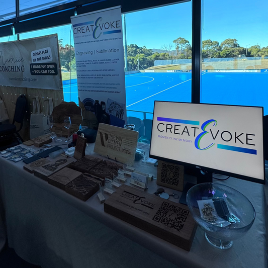 Createvoke stall at Tasmanian Small Business Expo 2025 with engraved products on display